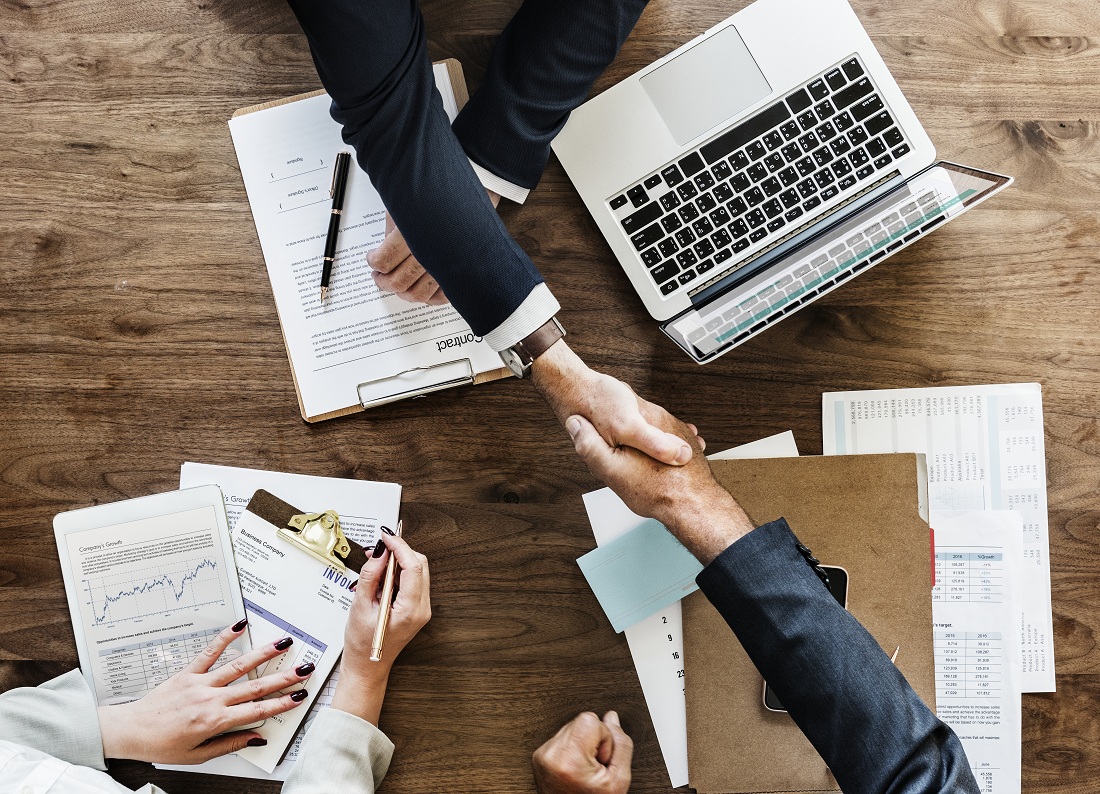 business people shaking hands together business people shaking hands together