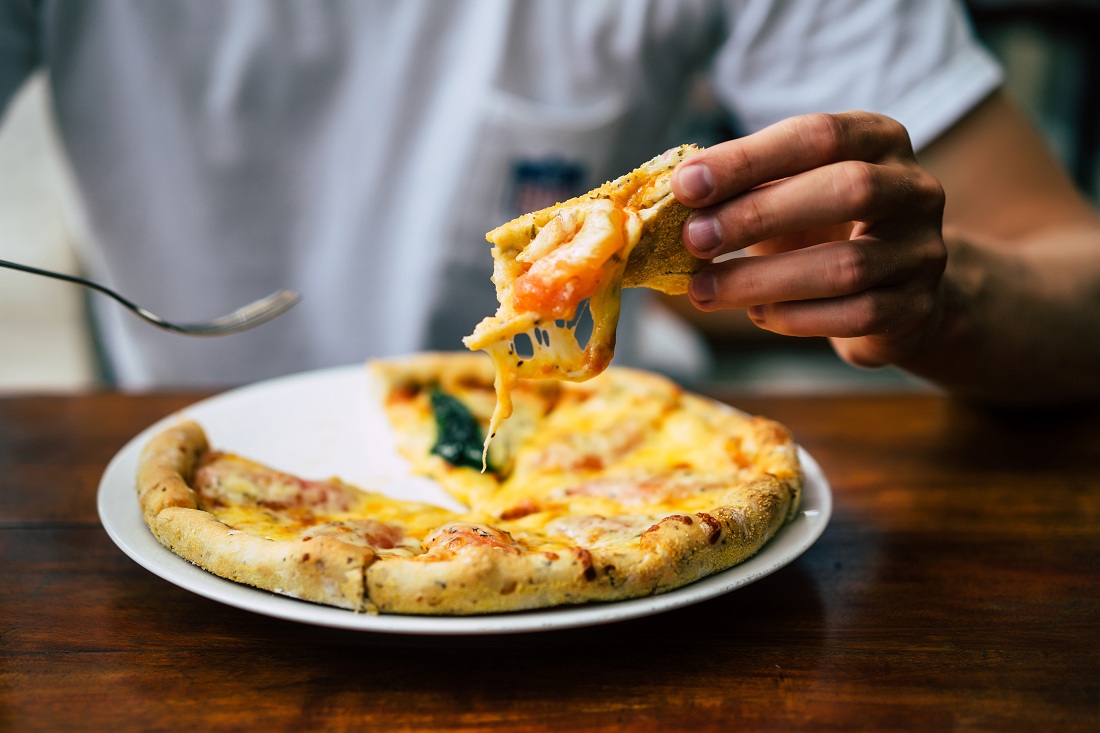 mans hands hold pizza mans hands hold pizza