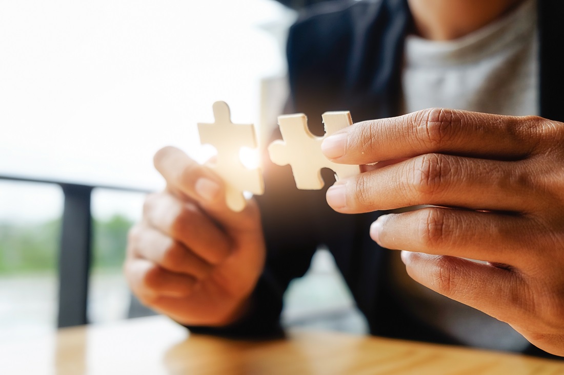 woman holding puzzle details woman holding puzzle details
